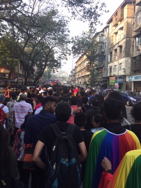 Marchers at Mumbai Pride pack into a busy street